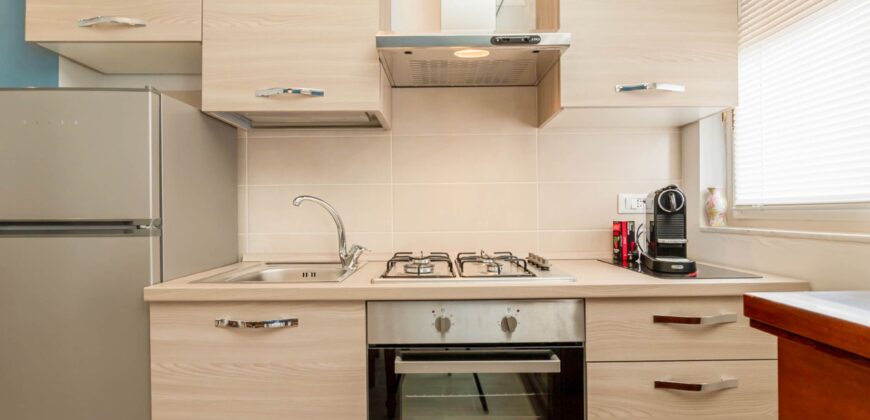 BILOCALE CON DOPPIO BALCONE E CANTINA –  VIA VERDI – 350 M DAL MARE – BORGHETTO SANTO SPIRITO